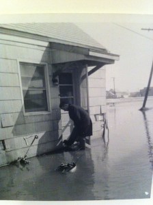 Arthur Leib rescuing the blue Bethany Beach house in the 1962 flood