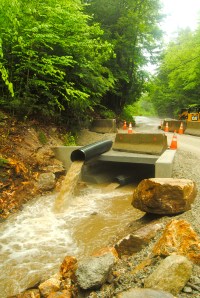 A box culvert is being inserted to enhance stormwater capacity