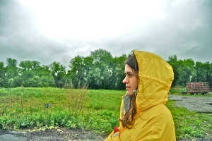 The author, Allie Goldstein, at Intervale Community Farm on a rainy day in Vermont. (Photo by the other author, Kirsten Howard.)