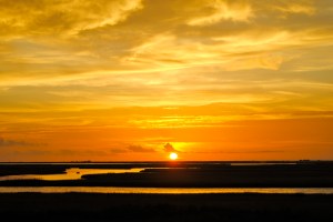 The sun sets on the threatened coastal wetlands in southern Louisiana
