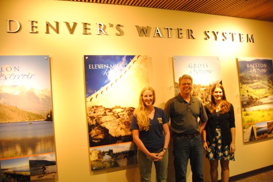 Kirsten Howard (left) and Allie Goldstein (right) stand with Don Kennedy at Denver Water's headquarters.