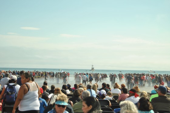 People wait to greet the paddlers in the 2013 Paddle to Quinault.