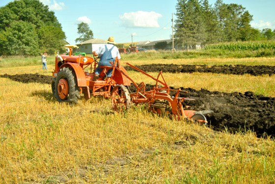 Farmers practicing for the next day's tilling competition in Belmond, IA
