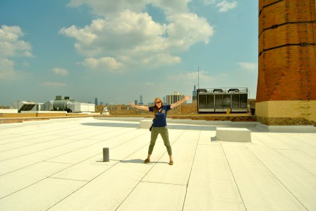 Road tripper Kirsten Howard embraces a sunny day on the roof