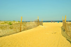 The gap in the seawall opens on a beautiful beach scene, but it leaves Sea Bright vulnerable