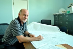 Steve Nelson shows us some plans. He has an 18-month contract to work part-time for Sea Bright as an 'embedded' long-term recovery planning manager. 